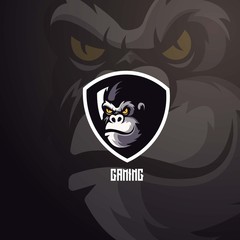 Gorilla athletic club vector logo concept isolated on dark background. Modern sport team mascot badge design. E-sports team logo template with animal vector illustration