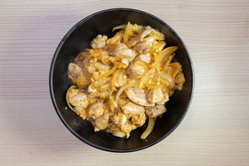 A bowl of oyakodon, chicken and egg rice bowl.