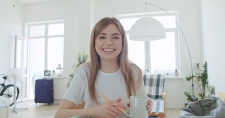 Young woman makes video conference