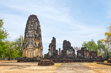 Ruins of unique temples in famous Sukhothai Historical Park, a UNESCO World Heritage Site, Foggy spring day in the ancient 13th and 14th centuries capital of Sukhothai. Thailand