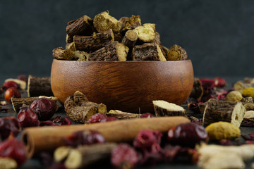 Licorice or liquorice root sticks isolated on dark or textille background stock photo