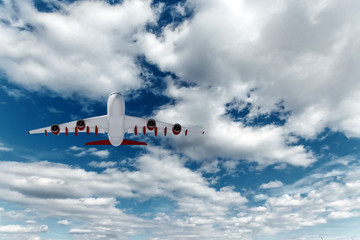 Passenger plane, airliner on a background of blue sky bottom view. The concept of air travel, travel. Copy space.
