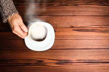 a female hands and coffee