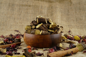 Licorice or liquorice root sticks isolated on dark or textille background stock photo