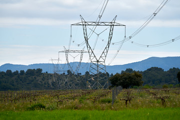 Obraz premium high voltage electricity pylon in a rural area