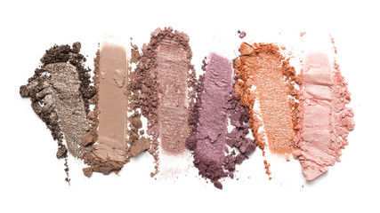 Close-up of make-up swatch. Smear of crushed multicolored set eye shadow