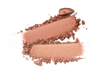 Close-up of make-up swatch. Smear of crushed brown eye shadow