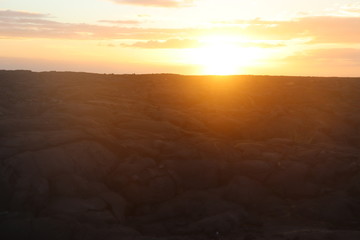 Sunset over beautiful lava stone landscape