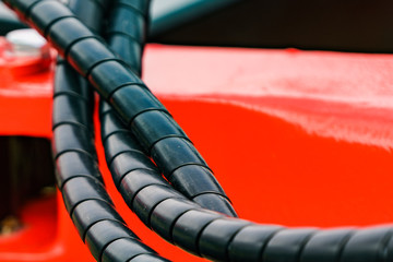 Hydraulic connections hoses in spiral wrap