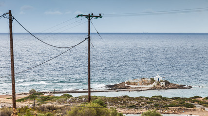 Greek coastline, Agios Fokas chapel and power line