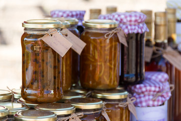 jars with passion fruit jams at the street fair