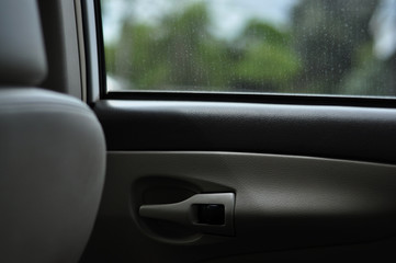 Car inside interior design with window and door panel view closeup