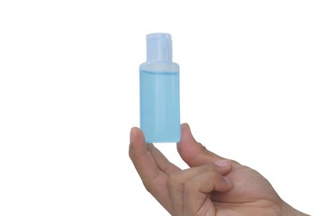 Hand holding a blue alcoholgel bottle. On a white background With Clipping Path.