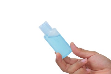 Hand holding a blue alcoholgel bottle. On a white background With Clipping Path.