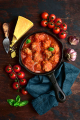 Meat balls in tomato sauce. Top view with copy space.