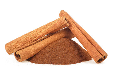 Cinnamon powder and cinnamon sticks stacked isolated on a white background. Cinnamon stick spice.