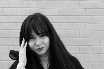 Woman on the street, severe migraine black white photo