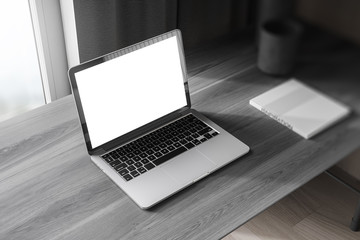 Mock up laptop screen in home office, top view