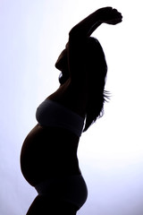 Silhouette of a pregnant woman 