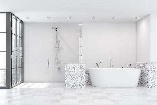 White mosaic bathroom with shower and tub