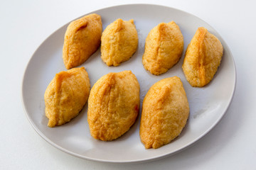 Korean style inari sushi which is fried tofu stuffed with rice