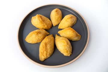 Korean style inari sushi which is fried tofu stuffed with rice