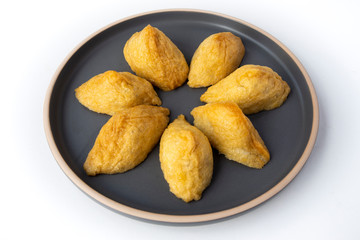 Korean style inari sushi which is fried tofu stuffed with rice