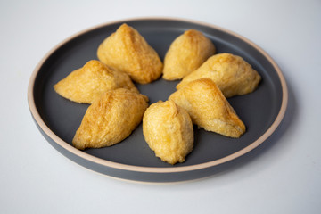 Korean style inari sushi which is fried tofu stuffed with rice