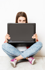 Woman Hide Face behind Laptop, Eyes Looking Peeking from Computer Screen, Isolated on White Background