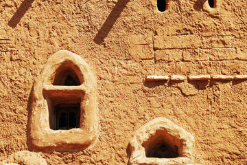 clay wall with Windows, old building in Arabic style