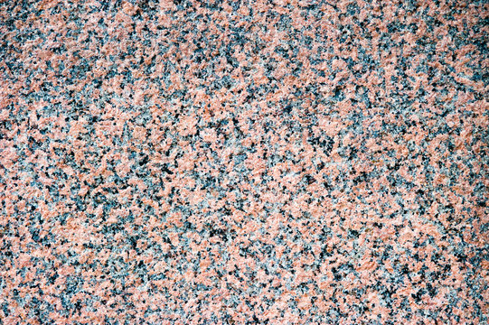 Red granite slab closeup  as background