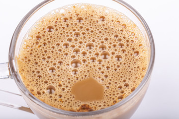 Close-up Top view of A glass of Coffee on White Background.