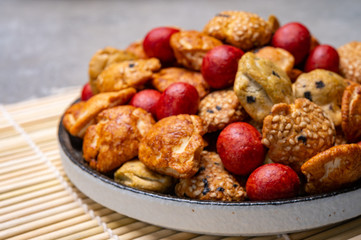 Tasty asian vegetarian appetizer, crunchy rice en peanuts snacks from Japan