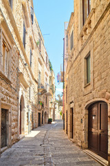 A narrow street in the village of Molfetta in Puglia
