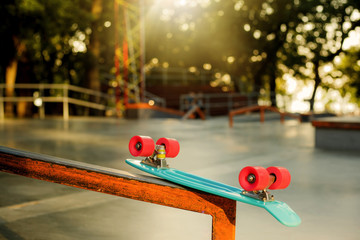 Youth plastic skateboard in a skatepark. Youth Summer Concept © splitov27