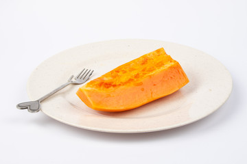Fresh cut papaya on white background.
