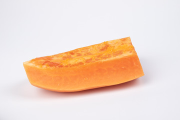 Fresh cut papaya on white background.