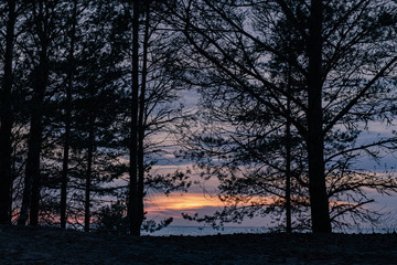 Naklejka na ściany i meble Sunset on lake Ladoga