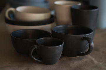 Matt ceramic handmade tableware in a workshop closeup