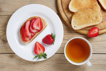 Strawberry sandwich and tea