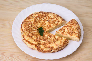 omelette with eggs and potatoes, typical Spanish omelette