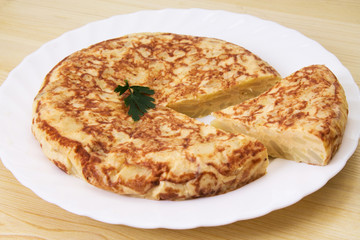 omelette with eggs and potatoes, typical Spanish omelette