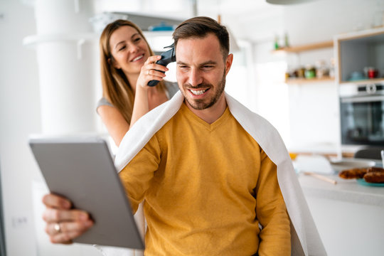 Self Hair Care During Quarantine. Couple Having Hair Cut At Home Isolation Coronavirus Pandemic