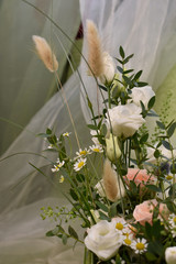 a bouquet of fresh spring flowers on a light background
