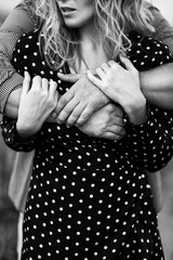 Couple Fashion Beauty, Young Woman dark Dress and Embracing Man in Love