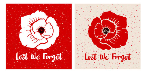 Set of two cards with bright poppy flower and phrase Lest we forget. International symbol of peace. Lest we forget hand written lettering. Vector illustration in hand drawn style. Isolated on a white.