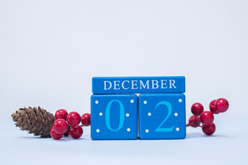 A festive clean Christmas-themed scene with calendar blocks for 1 December date