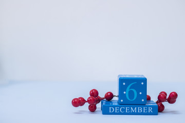 A seasonal clean Christmas-themed scene with calendar blocks for 8 December date