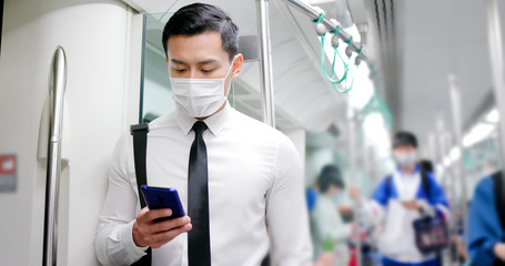 man with mask in mrt