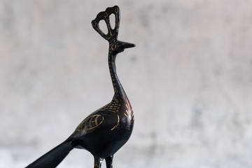 black color metal Peacock sculpture on white background view